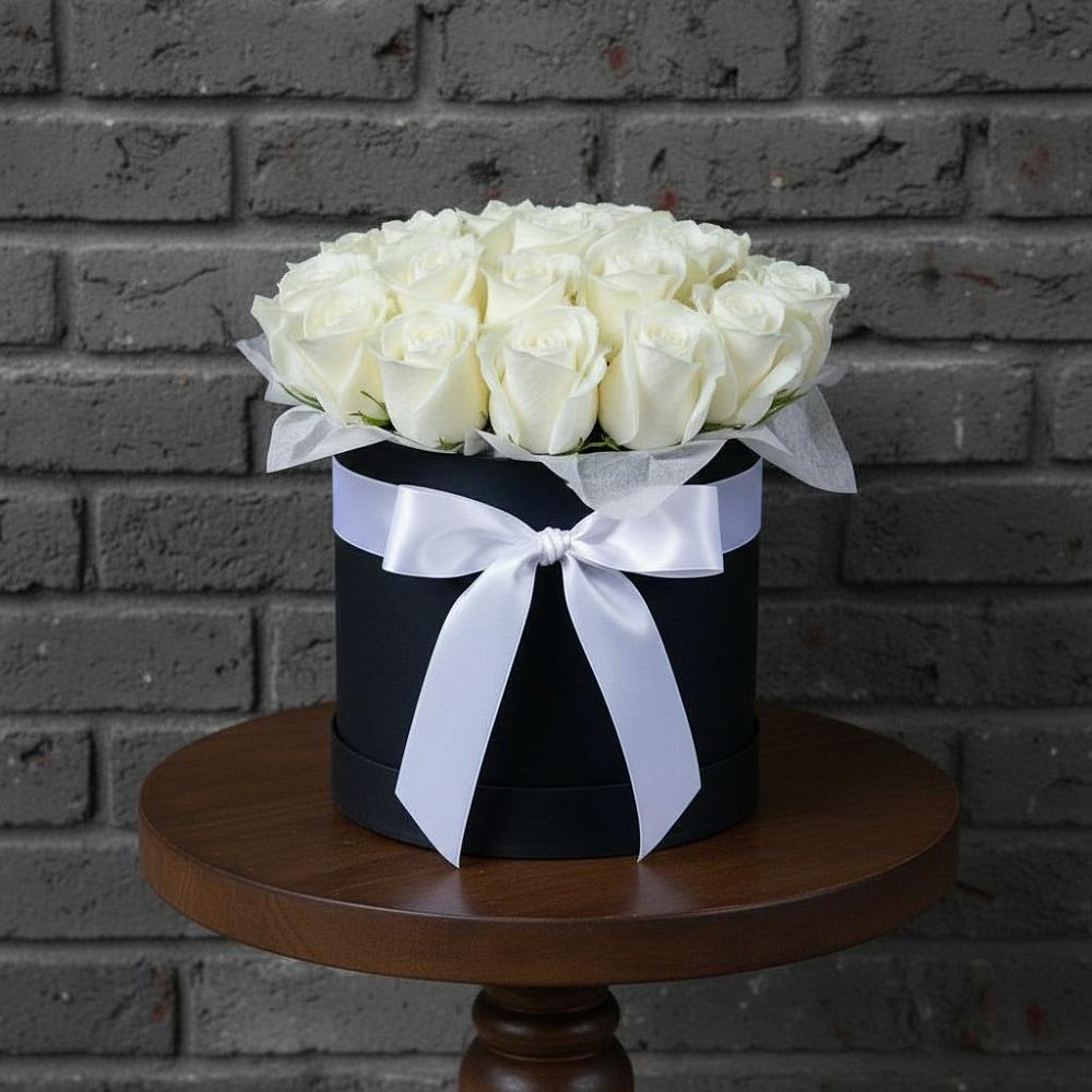 Цветочная композиция из Розы в шляпной коробке в Спасском Ставропольской области